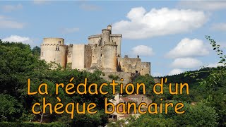 Comment rédiger un chèque bancaire [upl. by Mirabel309]