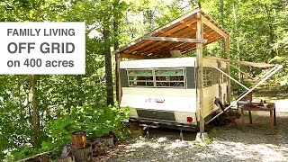 Family Living Off Grid in Camper Trailer amp Tree House Style Studio [upl. by Gleason]