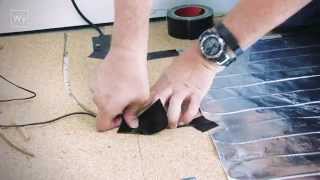 Installing electric floor heating under laminate flooring [upl. by Cowie]