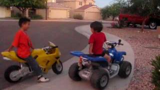 Motorcycle 4 year old on ATV 12 volts versus 7 year old on Motorcycle 36 volts [upl. by Ambert]